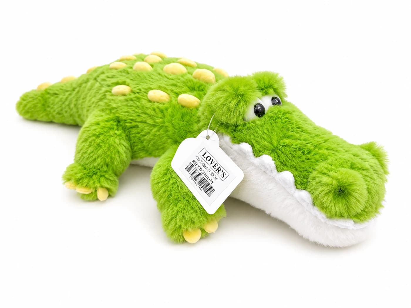Peluche de cocodrilo mediano verde con detalles amarillos y panza blanca